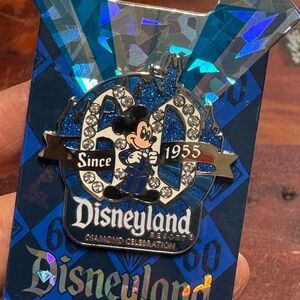 Disneyland 60th Anniversary Pin new on cardboard. Disney trading Mickey pin back